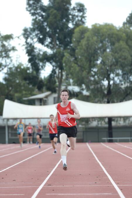 South Bendigo's Nigel Self powers to victory in the first of the 300m heats. 