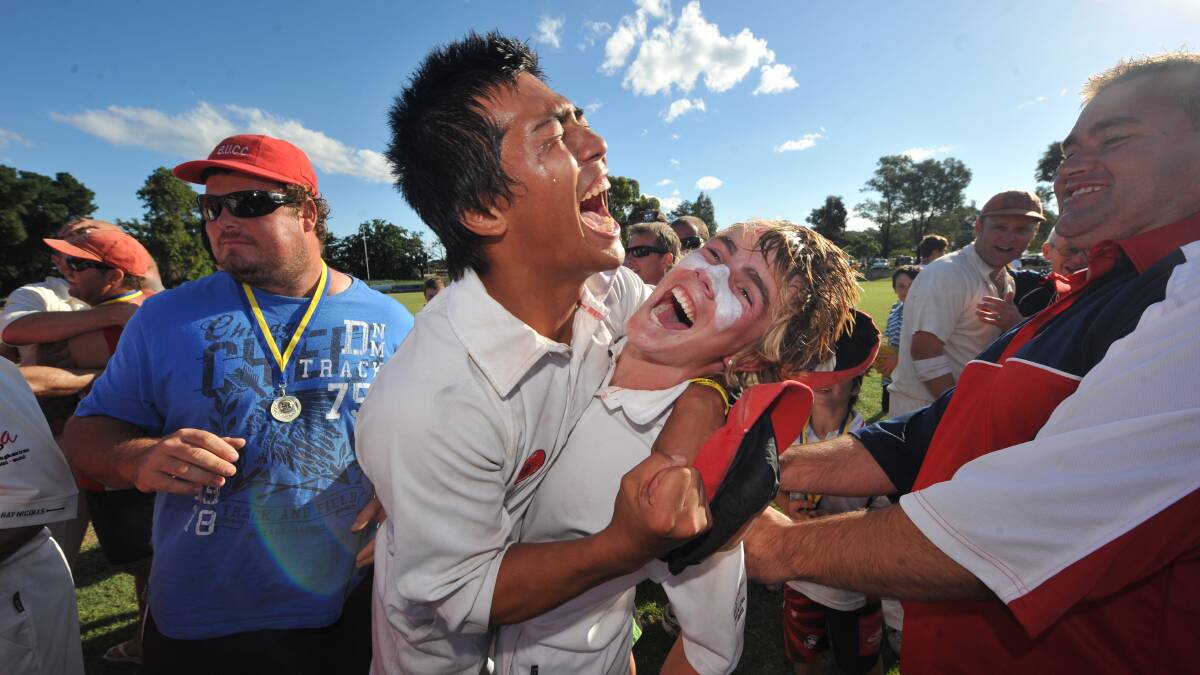 Bendigo United's Miggy Podosky and Harry Donegan after the dramatic grand final victory in 2010. 
