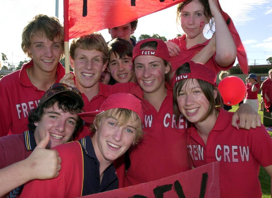 "The Frew Crew" cheer on housemates at Girton Grammar's swimming carnival in 2005 at Bendigo Aquatic Centre. 