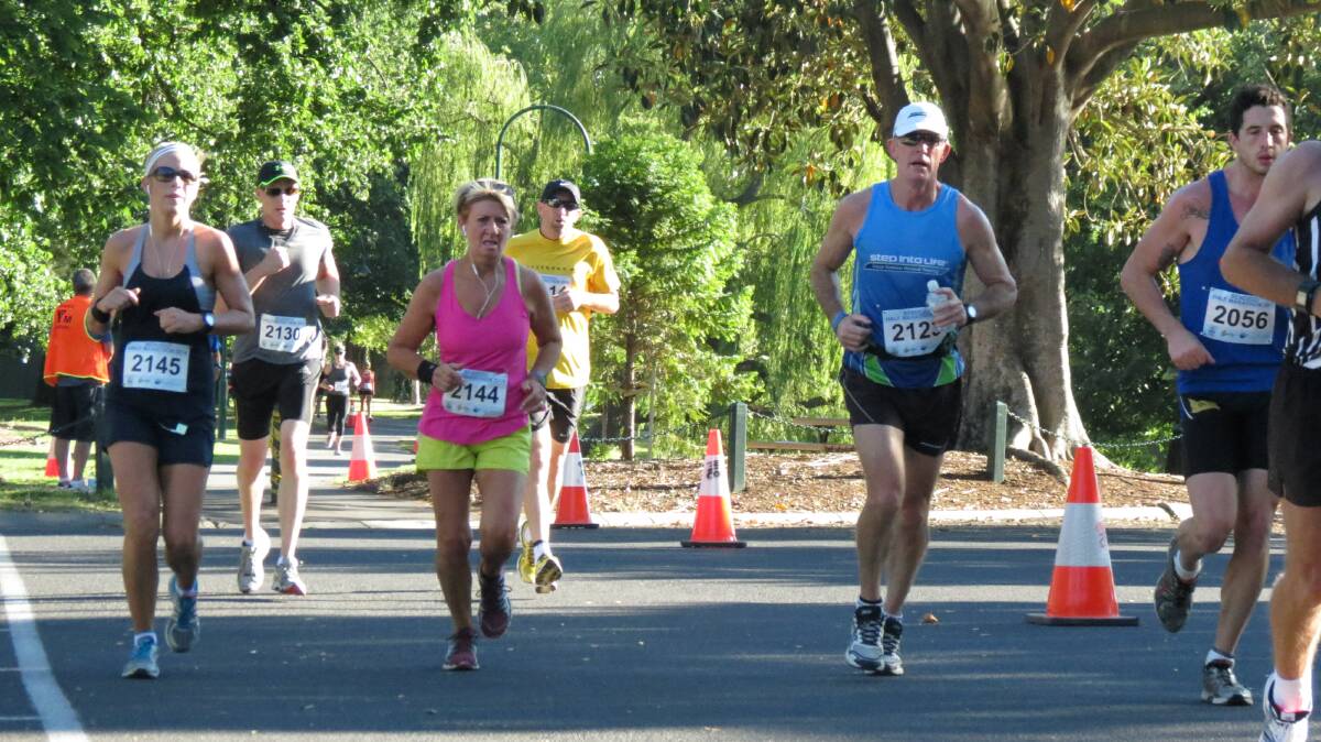 Athletes race around Lake Weeroona in the Oceania Masters and open half-marathon in Bendigo. Picture: HUNTER GILL 