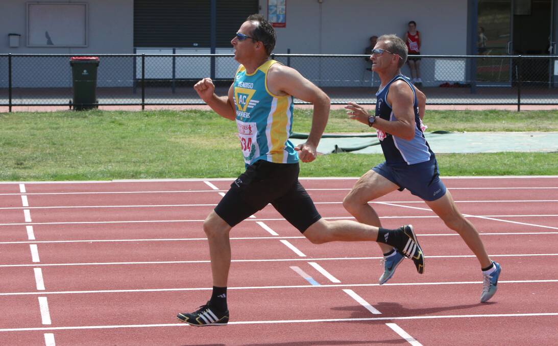 SPRINT: Paul Pryse and Terry Hicks will both compete in Oceania Masters Games events on the Flora Hill athletics track. Picture: PETER WEAVING