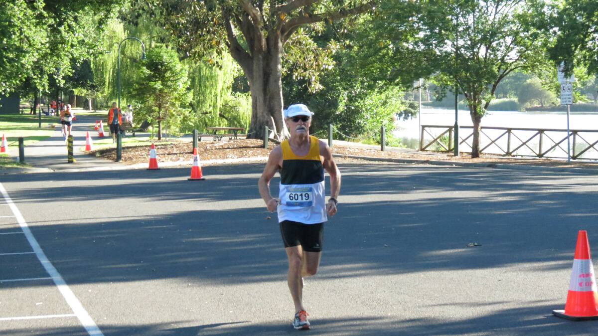 Geoffrey Graham competes in the 60-64 years class of the half-marathon at the Oceania Masters athletics titles in Bendigo. Picture: HUNTER GILL 