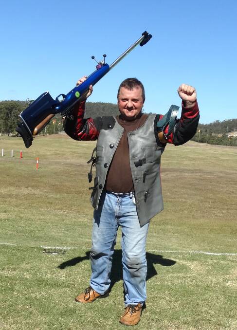 RANGE RULER: Bendigo's rifle-shooting ace Geoff Grenfell celebrates his Australian Queen's Prize victory in Brisbane. Picture: CONTRIBUTED 