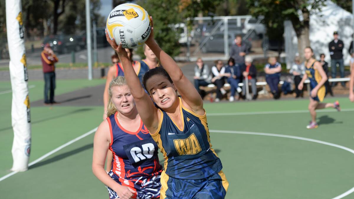 BEST ON COURT: Bendigo wing attack Tiana Newman catches this pass in the clash with Gippsland. Picture: JIM ALDERSEY