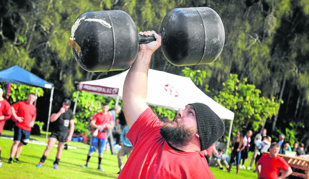 Stewart Cook made it look easy as he lifted the 40kg weight above his head. Picture: PERRY DUFFIN