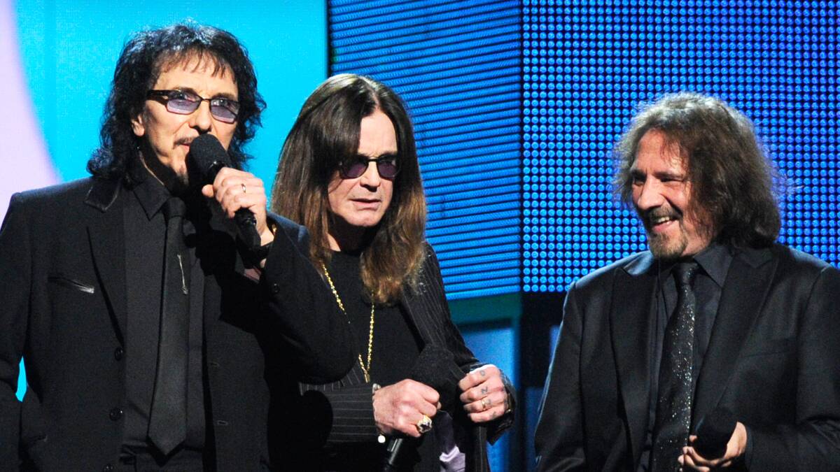 Musicians Tony Iommi, Ozzy Osbourne and Geezer Butler of Black Sabbath speak onstage during the 56th GRAMMY Awards at Staples Center on January 26, 2014 in Los Angeles, California. Photo: GETTY IMAGES