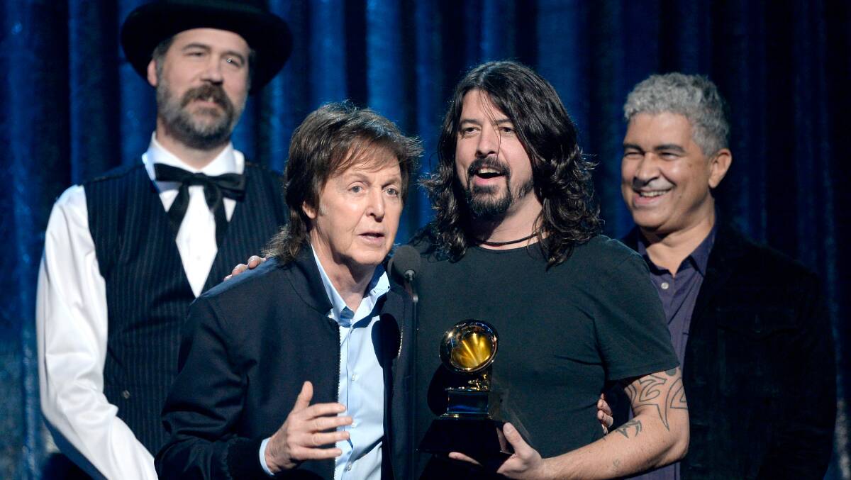  (L-R) Musicians Krist Novoselic, Paul McCartney, Dave Grohl, and Pat Smear accept the Best Rock Song award for 'Cut Me Some Slack' onstage during the 56th GRAMMY Awards at Staples Center on January 26, 2014 in Los Angeles, California. Photo: GETTY IMAGES