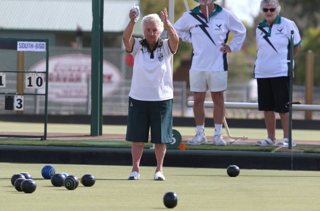 Ninety-year-old Agnes applauds a team-mate's efforts. Picture: PETER WEAVING