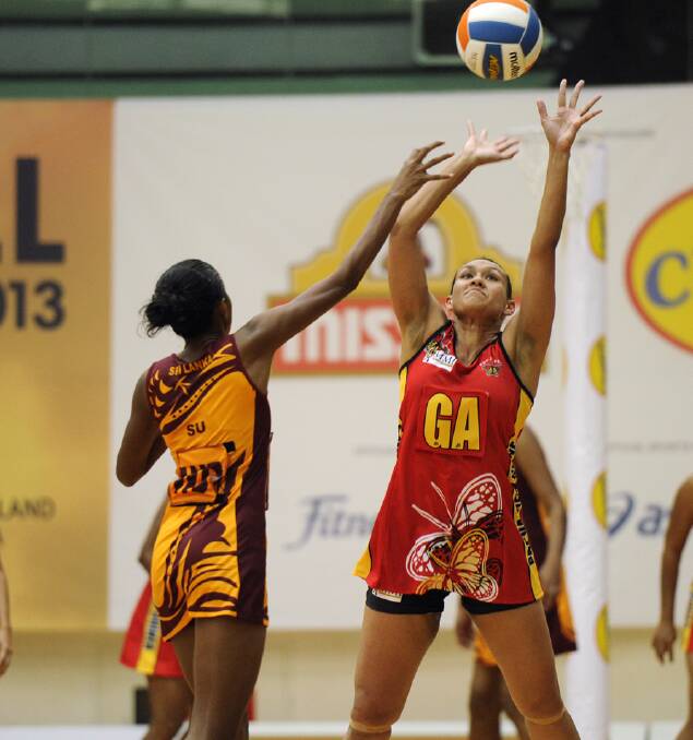 LEADER: Maleta Roberts, right, co-captained PNG at the Nations Cup. Picture: NETBALL SINGAPORE