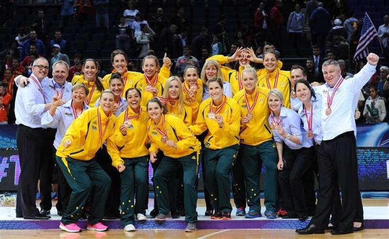 Gabe Richards, fourth from left in the back row, give the thumbs up after the Opals received bronze medals at the 2014 world titles. Picture: BASKETBALL AUSTRALIA 
