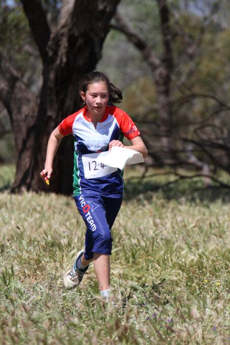 ON COURSE: Bendigo orienteer Caitlyn Steer competes for Team Vic. Picture: STEVE BIRD