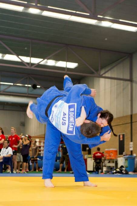 Tegan Bubb throws judo coach Ben Donegan during drills at the AIS Sports Draft camp in Canberra. Pictures courtesy of the AIS