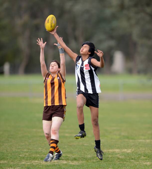 SKILLS: Choney Meemusour, right, is part of the North Ballarat Youth Girls Academy. Picture: JIM ALDERSEY