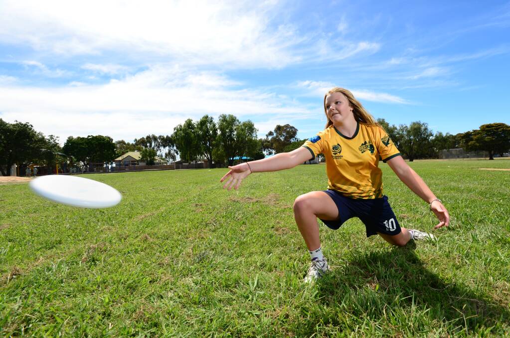 STYLE: Alyce Falls shows the skills that have led to her selection in the Australian under-19 Ultimate Frisbee team. Picture: JIM ALDERSEY
