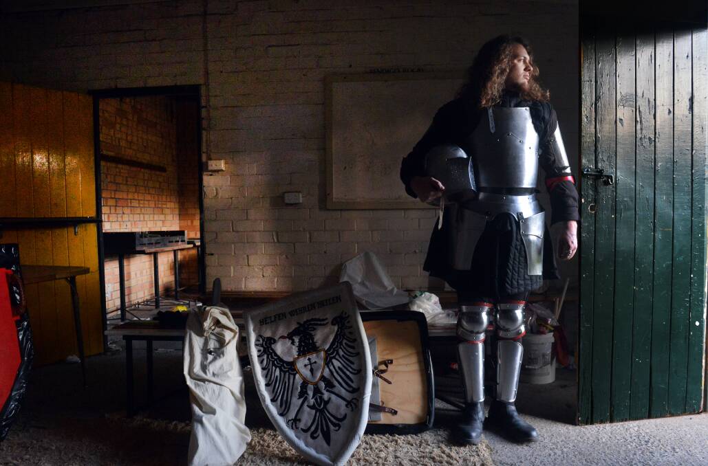 Medieval swordcraft enthusiast Max Weber pauses before stepping out into a swordfight re-enactment.  Picture: Brendan McCarthy