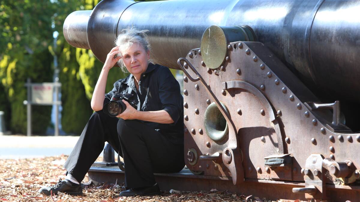 Pictured at the cannons in Eaglehawk, photographer Julie Millowick is on a quest to photograph 100 WW1 monuments for a book she is publishing.
Picture: PETER WEAVING