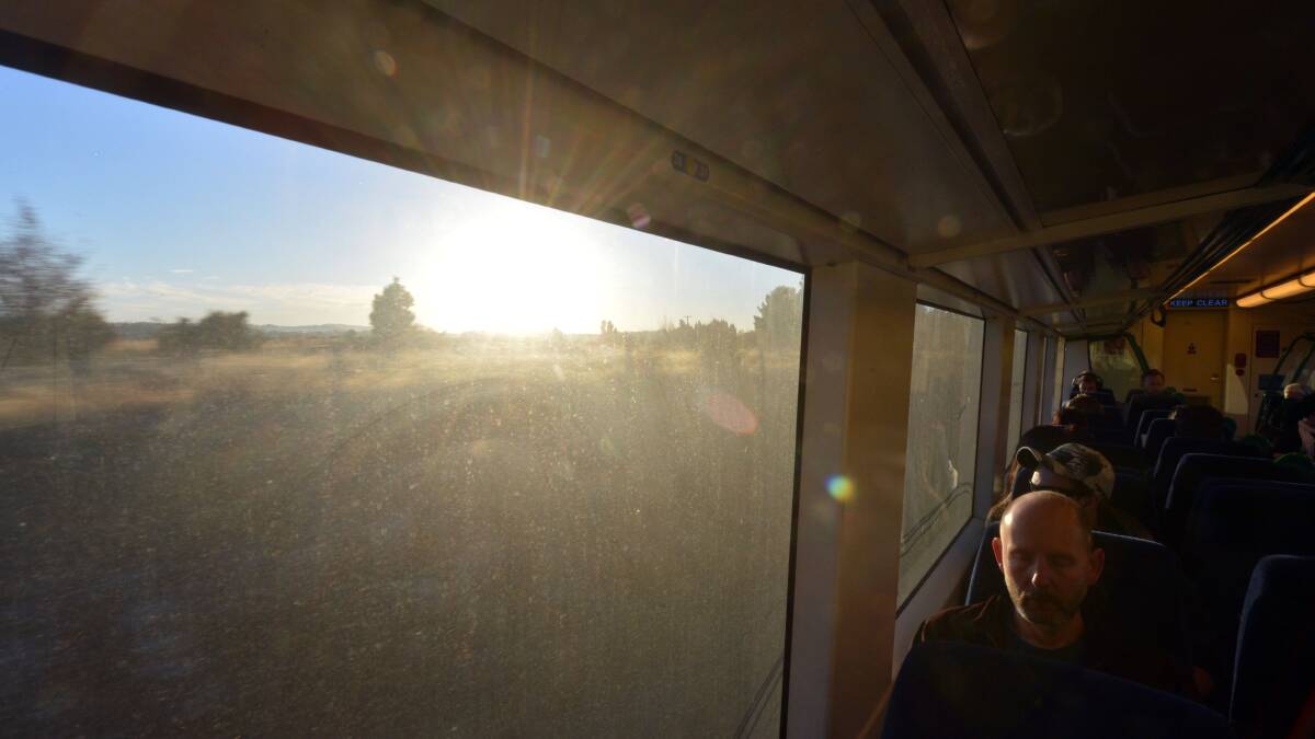 On the early morning train from Bendigo to Melbourne.
Picture: BRENDAN McCARTHY