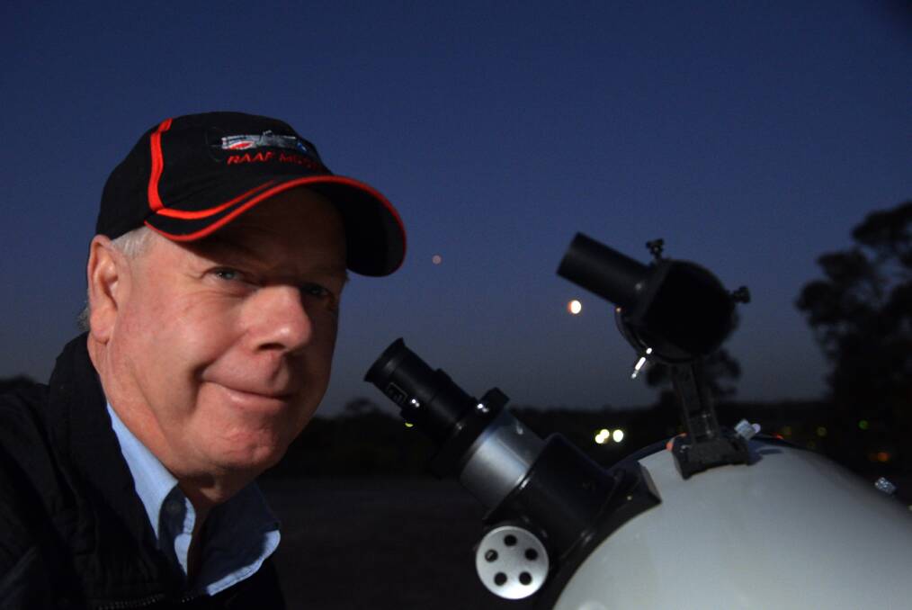 Stuart Williams of BDAS at one of the telescopes set up as an impromptu observatory in Tucker St Reserve in Golden Square
Picture: BRENDAN McCARTHY

