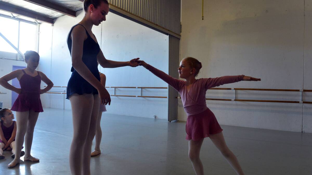 Student dancer Gemma Chisholm (right) gets some one on one instruction from senior student Sarah Seery.
Picture: BRENDAN McCARTHY