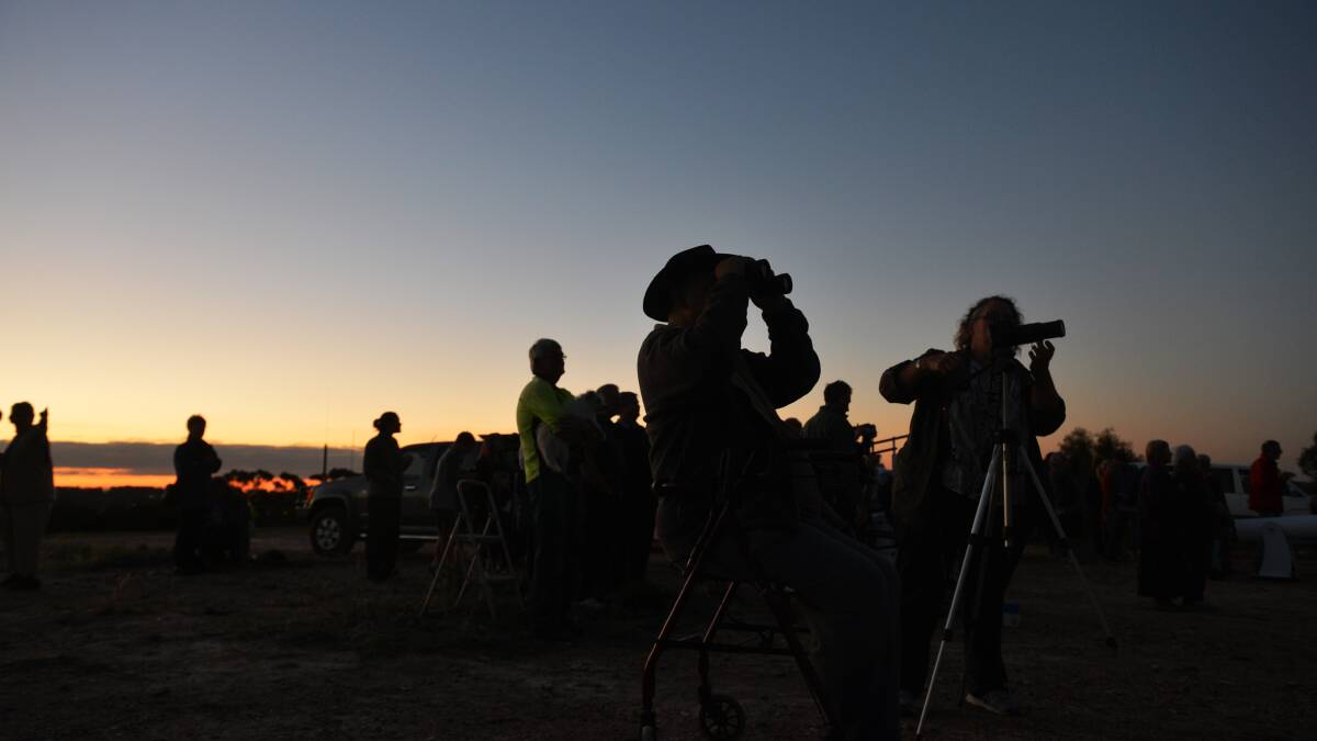 Waiting for the eclipse in Tucker St Reserve in Golden Square
Picture: BRENDAN McCARTHY
