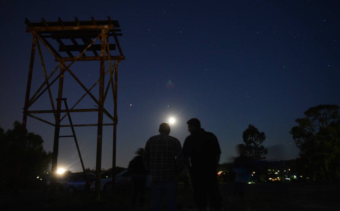 Watching the eclipse in Tucker St Reserve in Golden Square
Picture: BRENDAN McCARTHY
