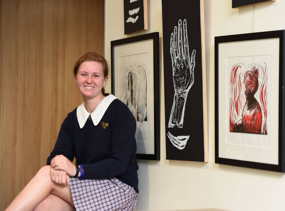 Bella Stone designed a bionic arm, which is now on display at the Melbourne Museum. Picture: JODIE WIEGARD