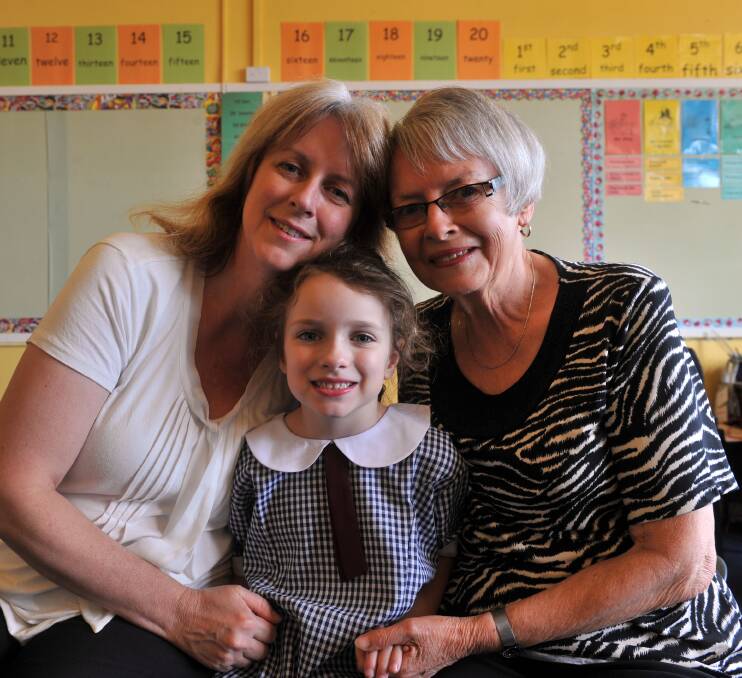 FAMILY TIES: Joanne and Mietta Livingstone, and Junette Phillips at Quarry Hill Primary School. Picture: BRENDAN McCARTHY
