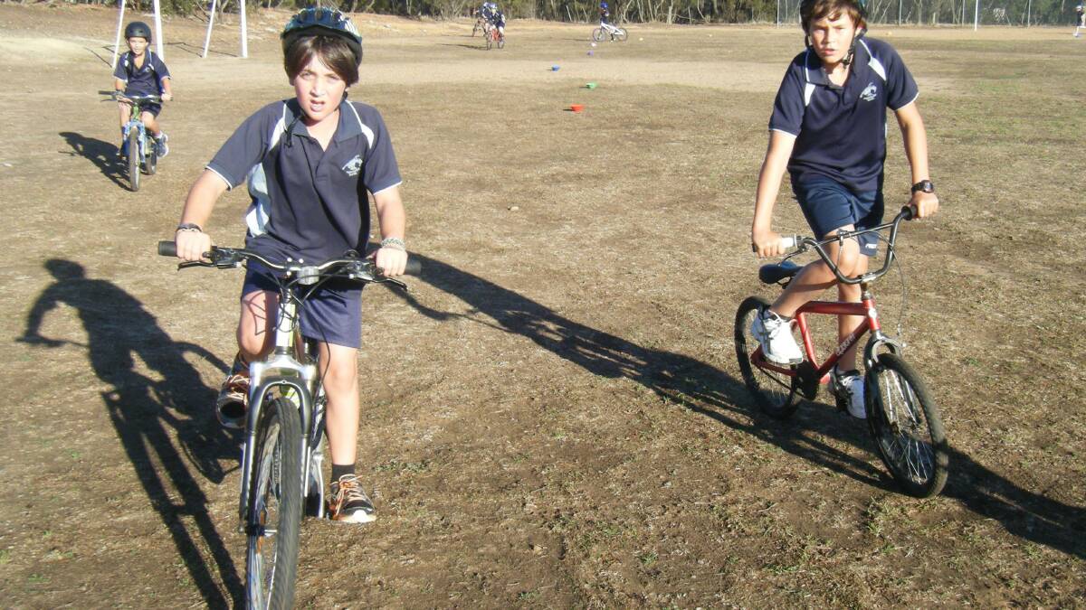 Jack Fitzgerald and Brayden Warren riding their bikes on the oval this morning. Picture: SUPPLIED
