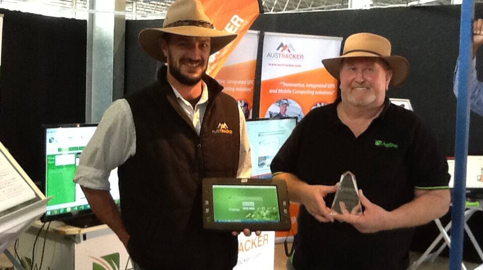 Clark and Stewart McConachy, of Aglive, with their technology and innovation award.