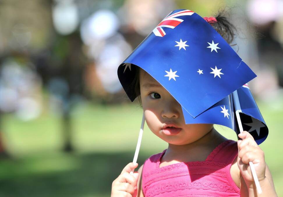 Daphne Reyes, 2, plays with her flags at Lake Weeroona on Australia Day last year. Picture: JIM ALDERSEY