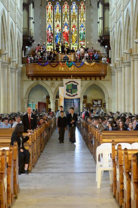 MASS: Students enter the cathedral. 