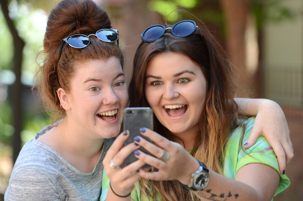 Catholic College Bendigo year 12 students Rosie Dickens and Darcey Cole are happy with their results. Picture: JIM ALDERSEY
