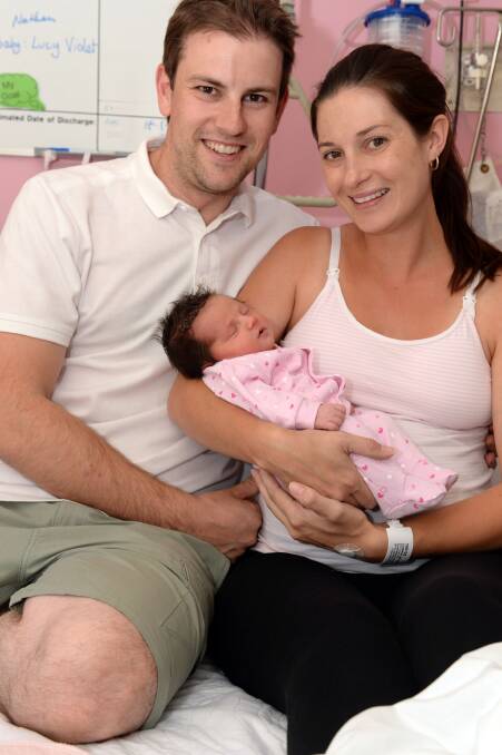 Lucy Violet Ludeman with parents Kylie and Nathan Ludeman. Picture: LIZ FLEMING