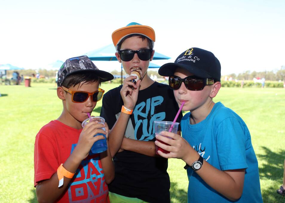SUN SMART: Ryan, Josh and Luke don hats and sunglasses. Picture: LIZ FLEMING
