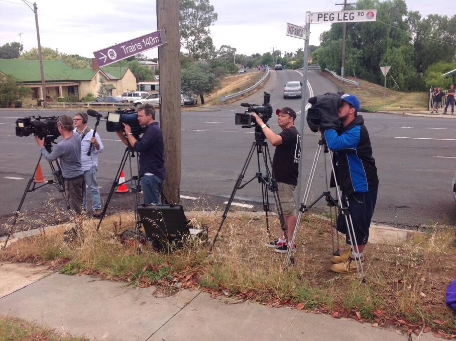 Media at the scene of a police operation in Eaglehawk. 