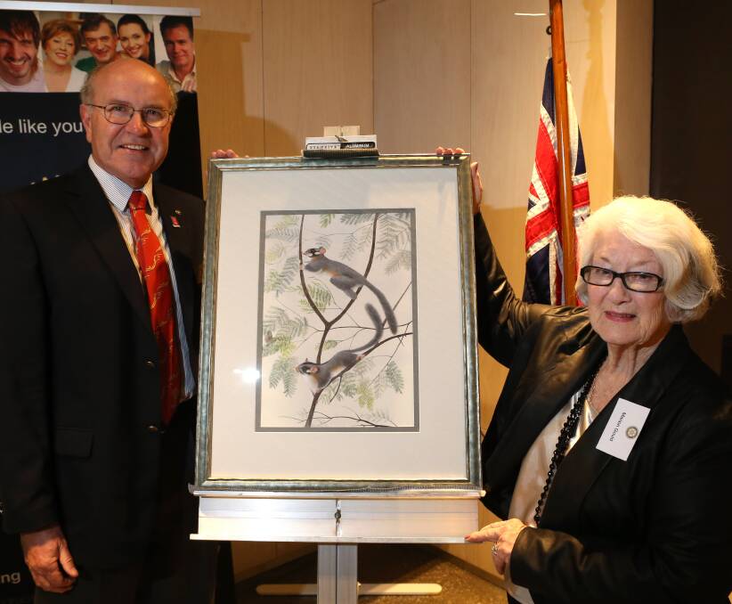 ART: Rotary Club of Bendigo South president Rod Spitty and artist Marion Gould.