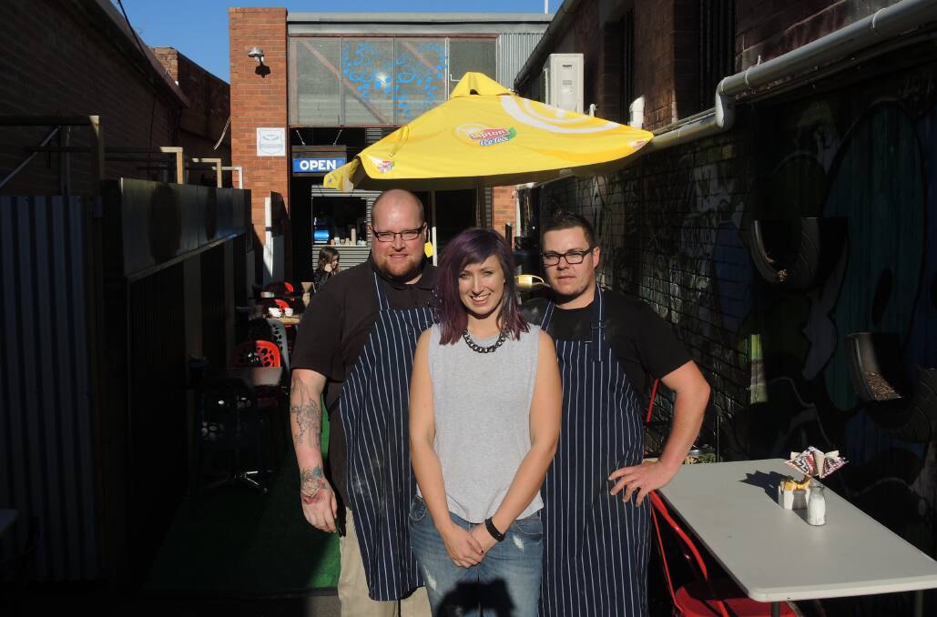 Head chef Tristan Burgess, events manager Olivia Darby and apprentice chef Nathan Rowan at Bella Blue. 