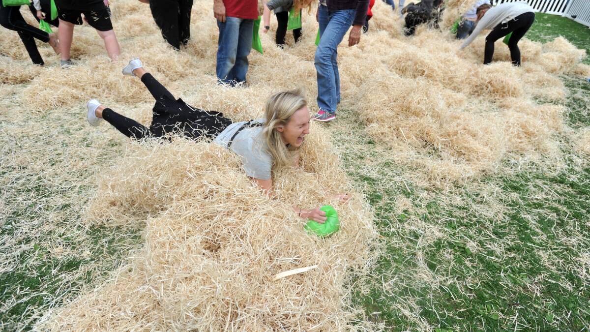 Addy journalist Maddie Wines taking part in the Vision Australia Easter Egg Hunt. Picture: JODIE DONNELLAN