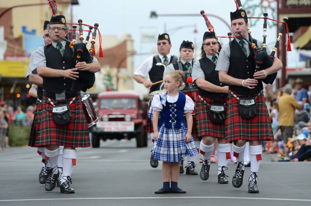 MARCHING: Cailey Finlayson marches along. Pictures: JIM ALDERSEY and BRENDAN McCARTHY
