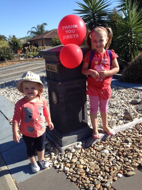  Harriet (4) and Darci (2) showing their support for our firies. 