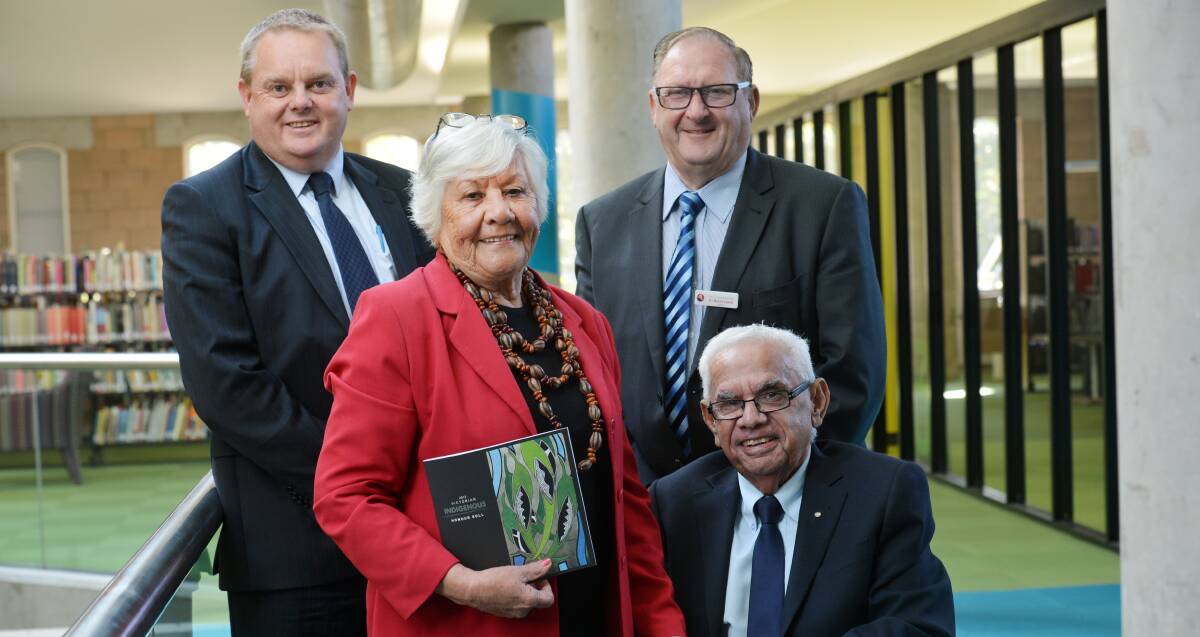 HONOUR: Aboriginal Affairs minister Tim Bull, Fay Carter, City of Greater Bendigo mayor Barry Lyons and Kevin Coombs at the launch at the Bendigo Library. Picture: BRENDAN McCARTHY
