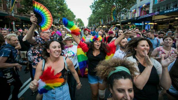Yes voters celebrate the same-sex marriage postal survey outcome on Oxford Street in Sydney last week. Photo: Anna Kucera