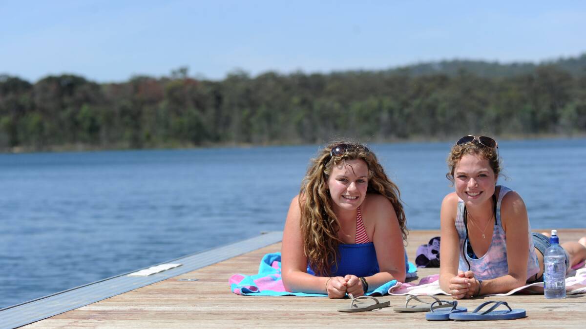 HEAT-SEEKERS: Larissa Hudgson and Emma Keulen at Crusoe Reservoir. Picture: JODIE DONNELLAN
