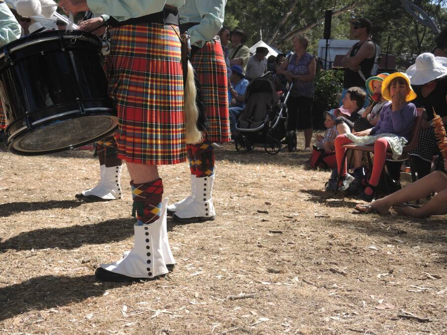 The Castlemaine Highland Pipe Band plays at the applefest. 