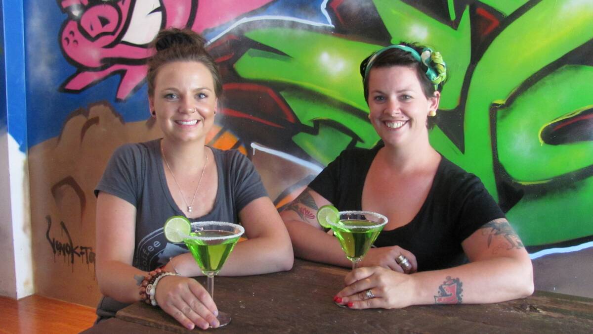 CHEERS: Brewhouse staff members Hannah Barrett and Jaime Smylie. Picture: DOROTHY COOK 