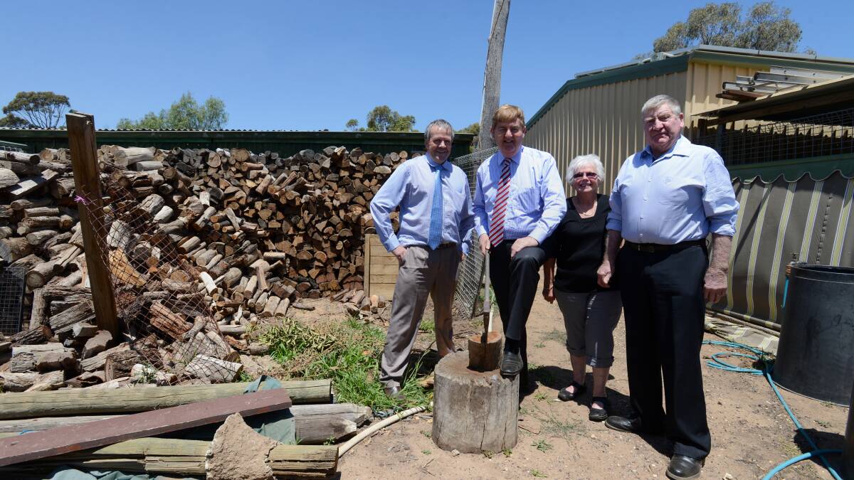 FUEL: MP Paul Weller and MP Peter Ryan with Dale and Jan Johnson. Picture: JIM ALDERSEY