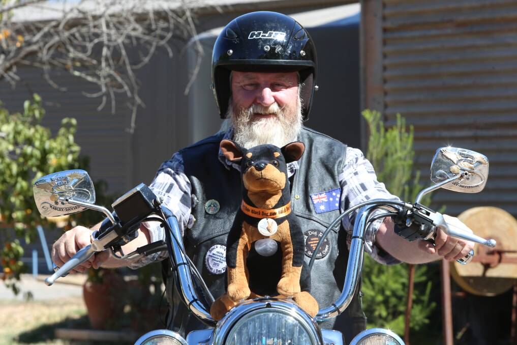 AWARE: Black Dog Rider Ric Raftis and his toy dog Winston. Picture: PETER WEAVING

