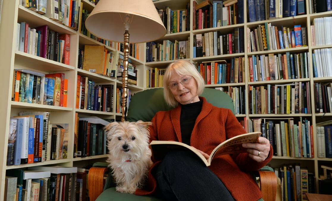 SEARCHING FOR ANSWERS: Noela Foreman with her dog Chloe. Picture: PETER WEAVING