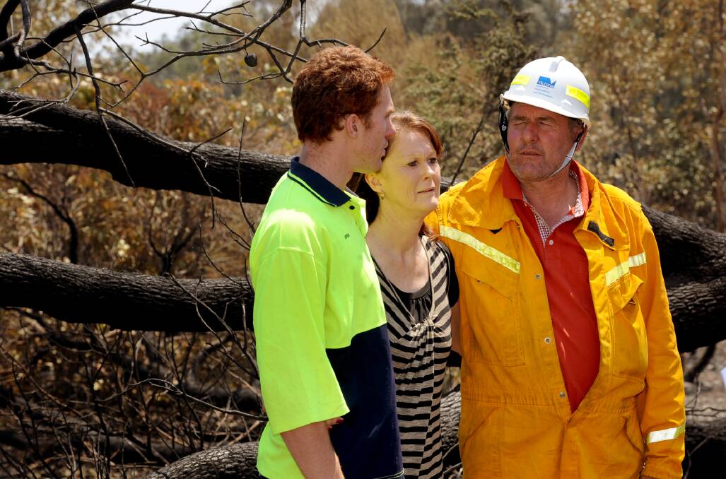 CONFRONTING: Josh, Jenny and David Grimble survey the damage to the Grimble property. Picture: SAMANTHA CAMARRI, WIMMERA MAIL-TIMES