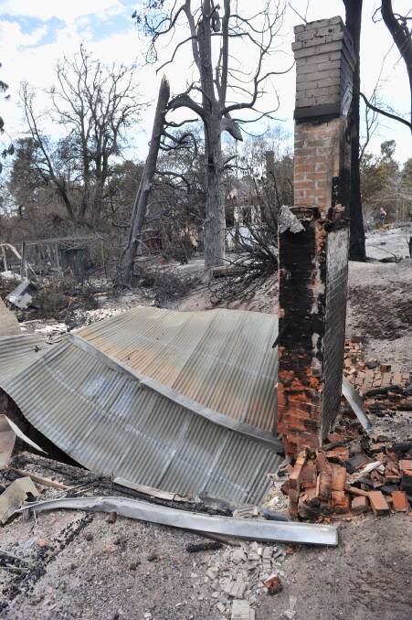 FEBRUARY 8, 2009: One of the homes destroyed by the fire in Happy Valley Road. Picture: Laura Makepeace